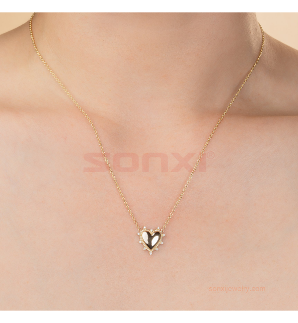Petite Diamond And Gold Heart Twist Necklace